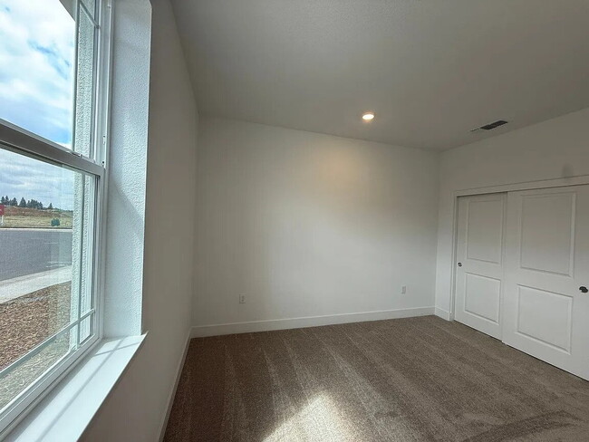 Building Photo - Be the first to enjoy this beautiful, newly built home near the Wild Hawk Golf Club