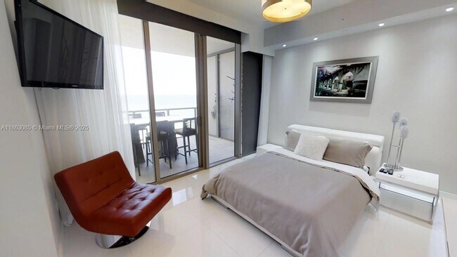 Building Photo - 9701 Collins Ave