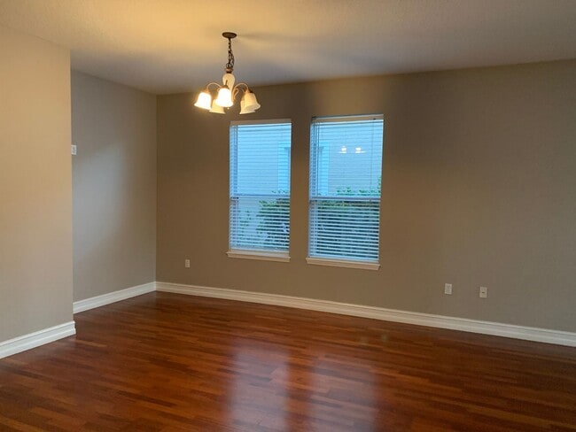 Building Photo - MOVE IN SPECIAL- Charming 3/2 home w/ formal office/4th bedroom and fenced yard in Harmony