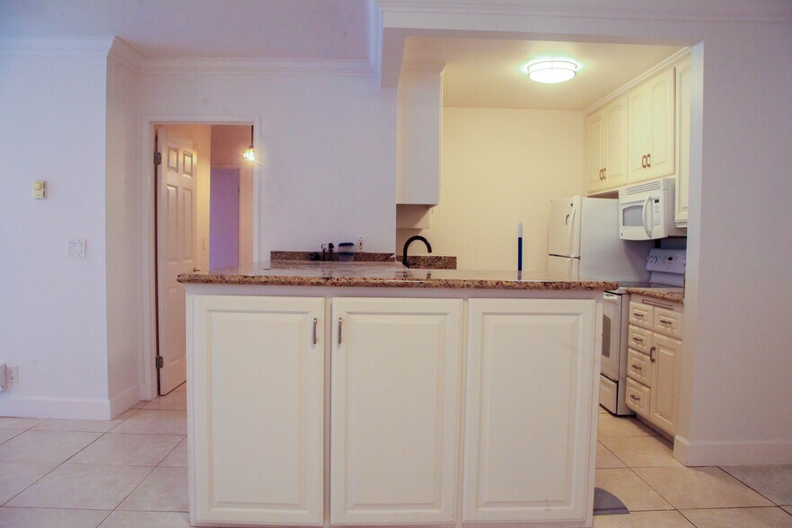 Kitchen and Walkway to Bedrooms - 7777 W 91st St