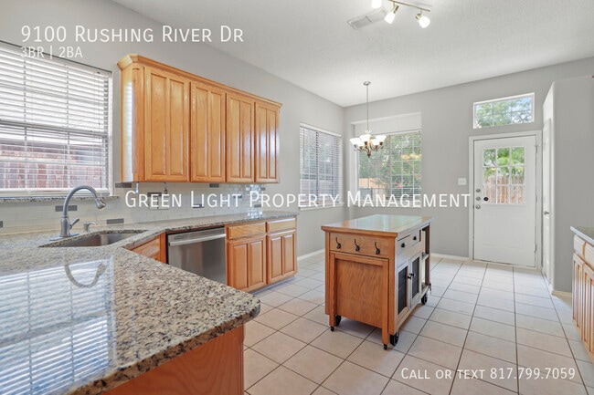 Building Photo - 9100 Rushing River Dr