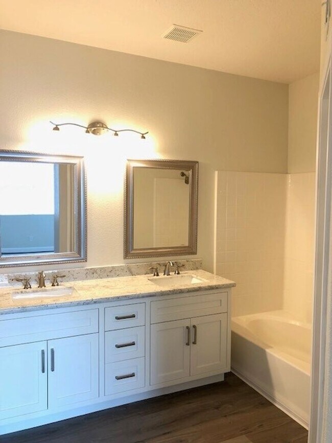 Building Photo - PICTURE PERFECT 2 BR/2 BATH PLUS LOFT END UNIT CONDO WITH DIRECT ACCESS 2 CAR GARAGE