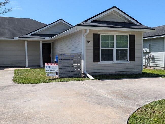 Building Photo - NOW AVAILABLE - 3/2 Duplex on this 24 mo Lease - Conveniently located off Lewis Speedway near St ...