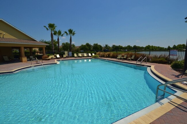 Building Photo - Beautiful 3/2 home near Lake Nona ~ Fenced In Yard ~ LVP & Tile Flooring ~ Community Pool!