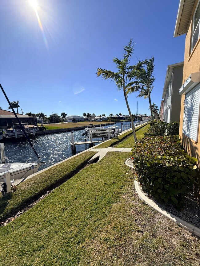 Building Photo - Waterfront Condo 3/2/1 - FULLY FURNISHED! - (Available annually or monthly)