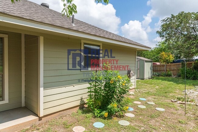 Building Photo - Well-Maintained Home with Large Yard and Storage Shed