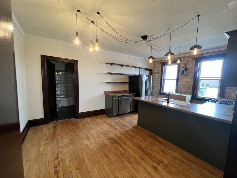 Dining Room into Kitchen - 415 E Saint Germain St