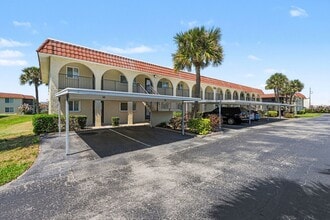 Building Photo - Must see 1st floor, corner unit in St Lucie Gardens.