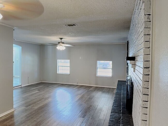 Building Photo - Private Backyard Oasis with Pool in the Heart of Saginaw!