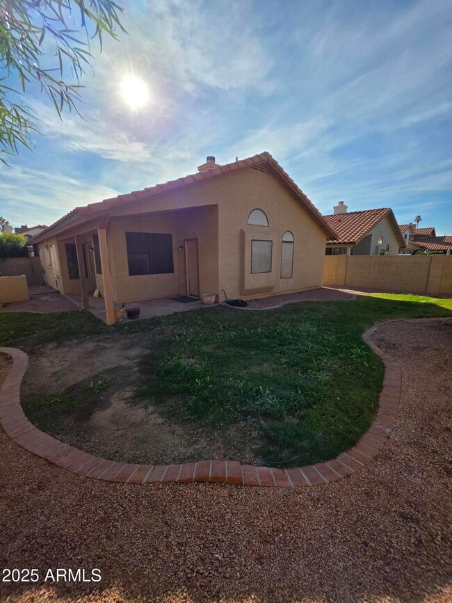 Building Photo - 5946 E Aire Libre Ln