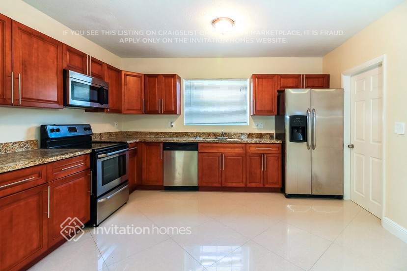Building Photo - 5660 W 9th Ct
