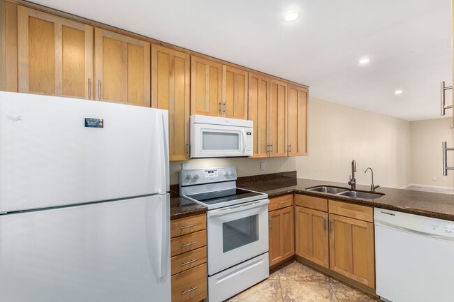 Building Photo - Remodeled 2-Bedroom, 2-Bath Condo in Prime...