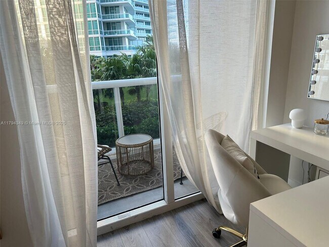 Building Photo - 10275 Collins Ave