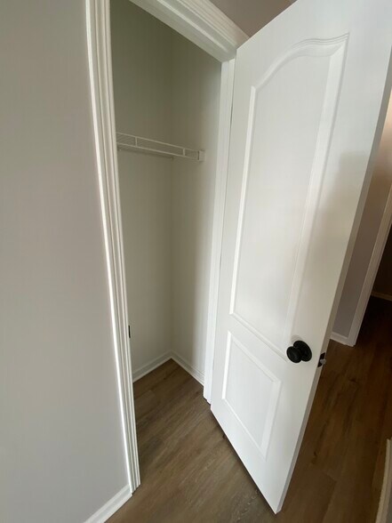 Hall closet - 220 SW Chartwell Cir
