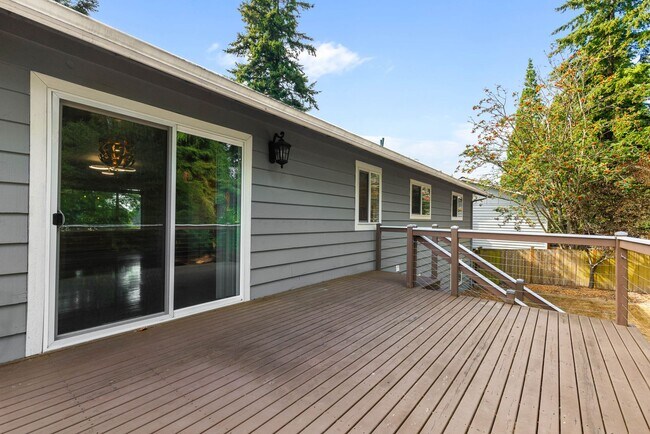 Building Photo - Updated Split-Level Home with Flexible Living Spaces & Backyard Deck