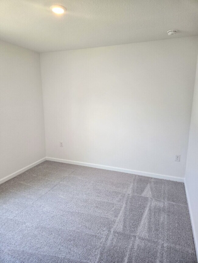 Building Photo - Welcome to your brand-new home in the Mallard Landing conveniently located to NAS Pensacola! INTE...