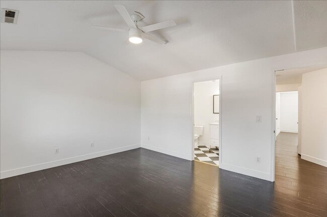 Building Photo - Versatile 4-Bedroom Corner Condo with Main...