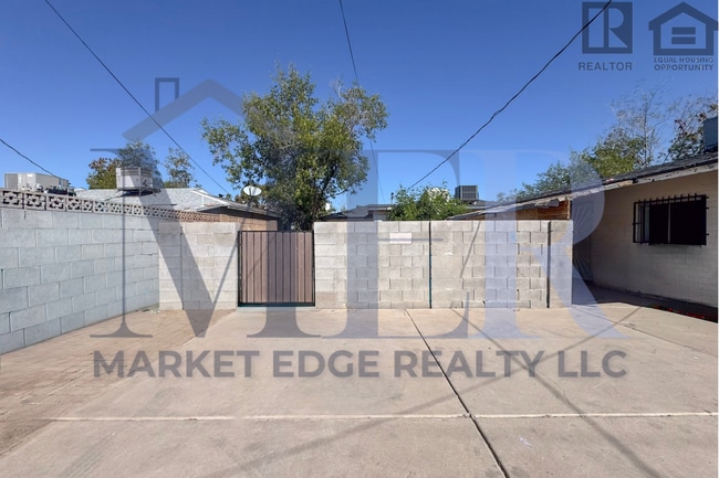 Building Photo - 2Bed/1Bath House at AZ-51/Thomas Rd! -- NO HOA! FENCED-IN YARD! -- NO APPLICATION FEE!