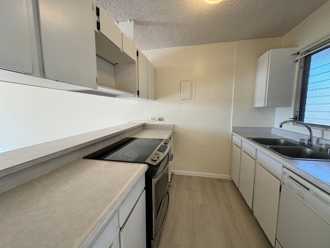 Building Photo - Spacious 2-Bedroom, 2-Bathroom Condo in Ai...