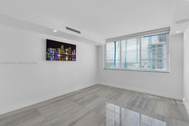 Building Photo - 5005 Collins Ave