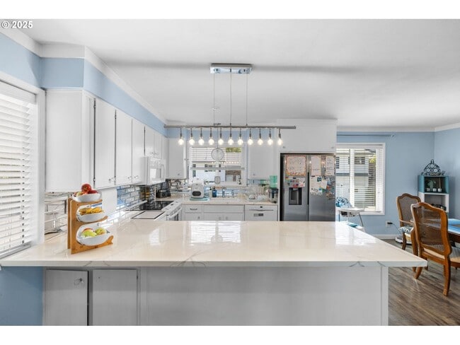 Building Photo - Bright and Open 1,638 SqFt Home Featuring Fireplace, Updated Kitchen & Scenic Outdoor Views ***Wa...