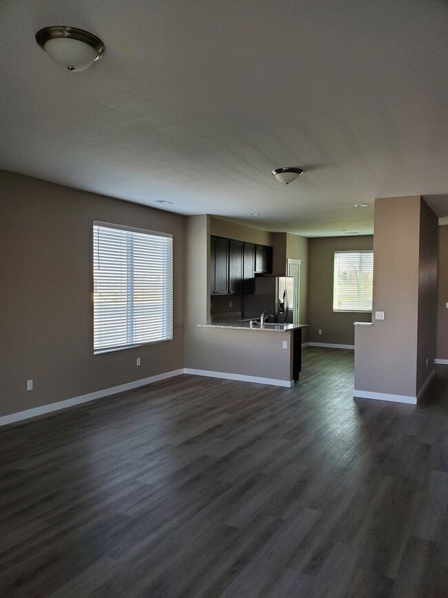 Building Photo - Newer Home with Garage & Fenced Yard