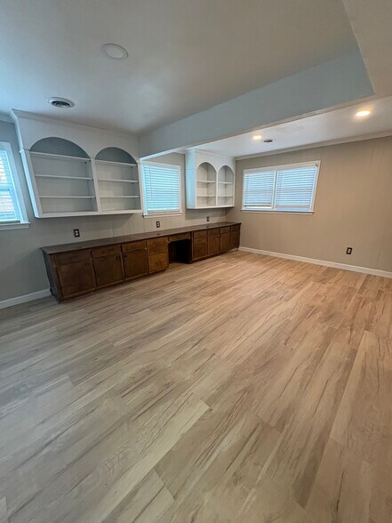 Basement with built-in cabinets - 304 S Almond Dr