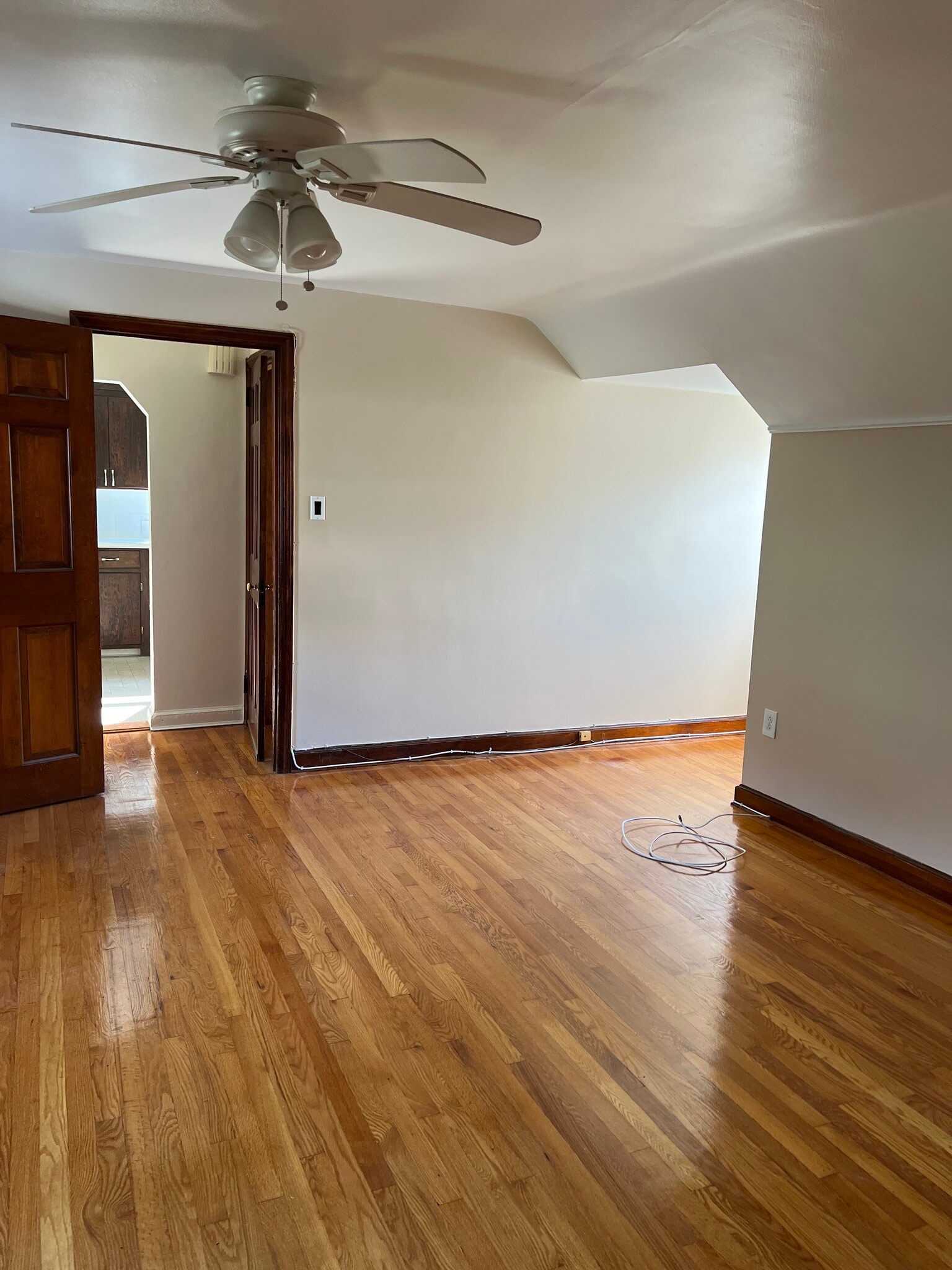 Living room looking at entrance and kitchen - 156 Maple St