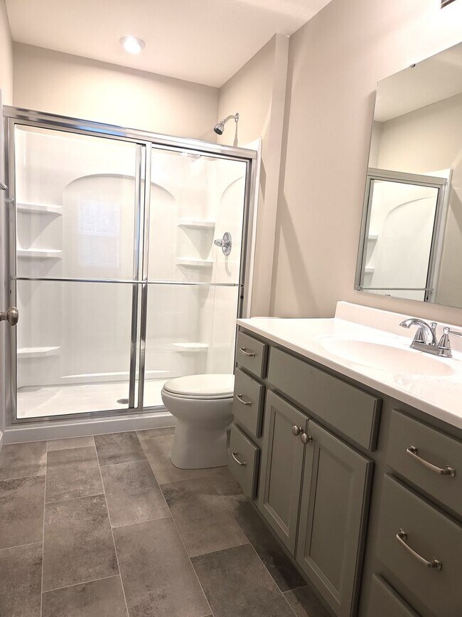 Building Photo - Exquisite brand new condo w/everything! Ground floor, no stairs, attached garage