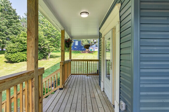 The covered front porch is perfect for a porch swing and rocking chairs to enjoy Pgh's seasons - 2416 Magee Road Ext