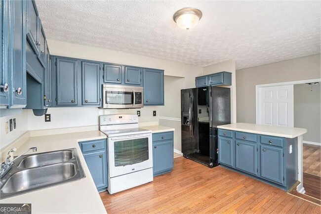 Building Photo - 7023 Grinder Dr