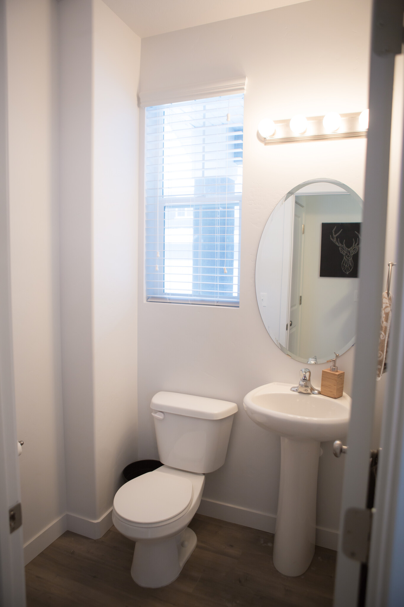 downstairs half bath - 3013 South Red Pine Drive