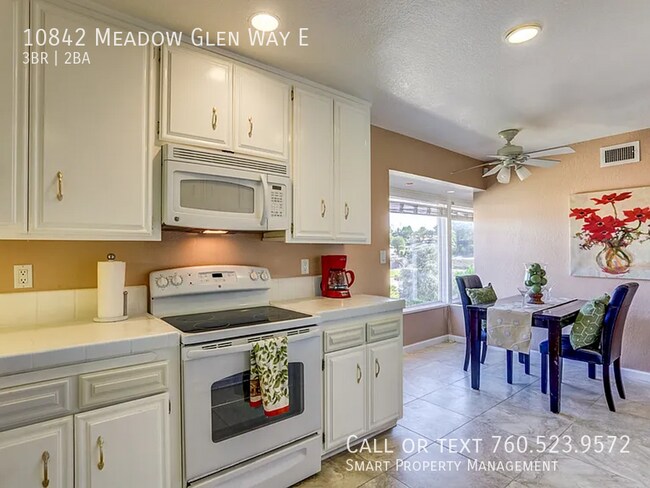 Building Photo - 10842 Meadow Glen Way E
