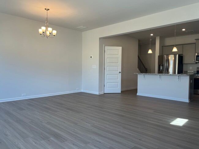 Building Photo - Beautiful Newly Constructed 3/.25 Townhome!