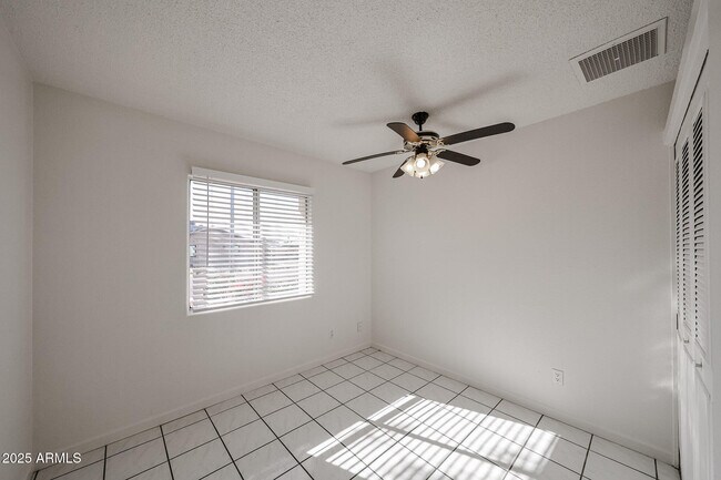 Building Photo - 3408 W Port Au Prince Ln