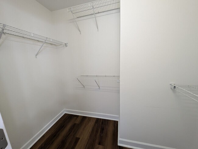 Building Photo - Pristine End Unit Townhome located in the Prosperity Place community!