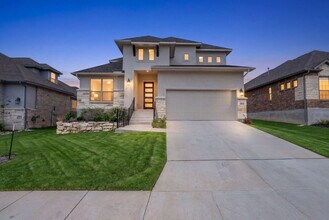 Building Photo - Rare Cibolo Canyons Opportunity | Guest Suite Downstairs, Optional 5th Bedroom, No Carpet, No Rea...