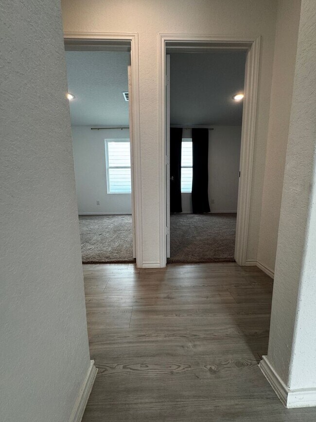 Building Photo - Modern 2024 New-Build with Open-Concept Living and Private Primary Suite in Waterwheel Subdivision