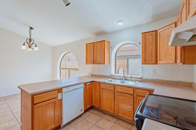 Building Photo - 43741 W Wade Dr