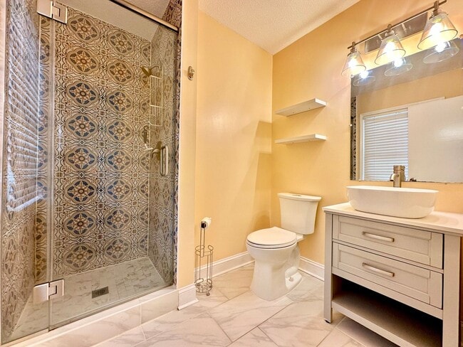 Building Photo - Updated 3BR Ranch | Large Lot, Deck & Modern Finishes – Minutes to Durham