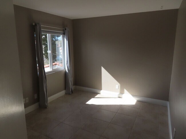 Building Photo - Renovated Three Bedroom Home