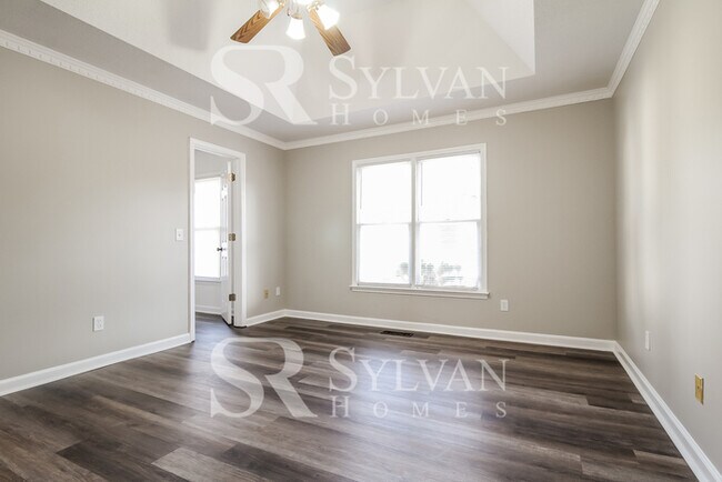 Building Photo - This lovely home is ready for your personal touch!