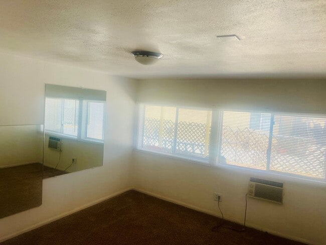 Building Photo - Charming 3-Bedroom Home with Wood Ceilings...