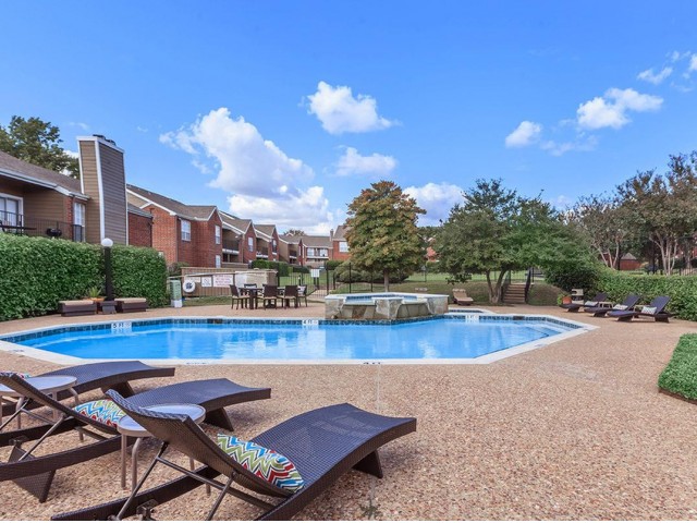 Relax in our water-scaped swimming pool! - Treymore North Apartments