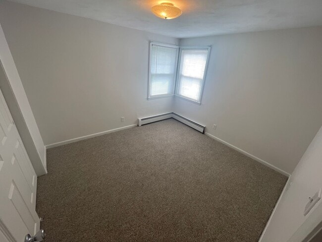 Building Photo - Charming 3-Bedroom Home with Backyard & Of...
