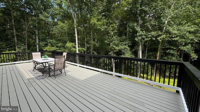 Building Photo - 10899 Woodland Falls Dr