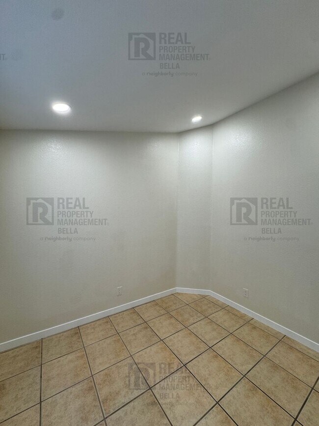 Building Photo - Corner-Lot Charmer with Open Layout and Sp...