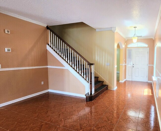 Building Photo - Spacious 4BR w/ Fenced Yard + Covered Lanai + 2 Car Garage  in Orange Park!