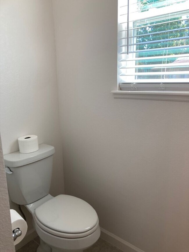 Building Photo - Like New 3 bedroom + den with French doors, screened in porch and Fenced yard and much more...