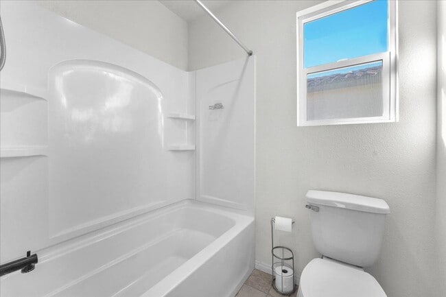 Building Photo - Gorgeous Five Bedroom in the SW! Solar panels!